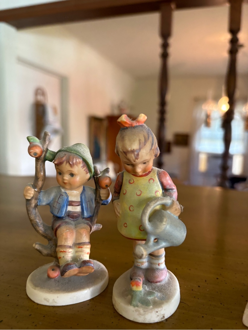 Hummel Porcelain Boy on Branch and Girl with Watering Can - Green, Blue, Pink
